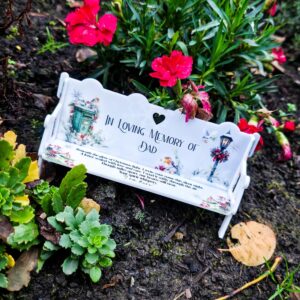 A Christmas Memorial Bench Ornament featuring a traditional festive post box and Robins.