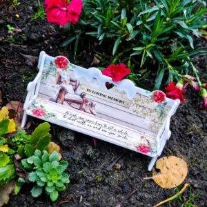 A winter memorial bench to display on graves at Christmas time. Featuring a cosy arm chair, robins, boots and Christmas poinsettias.