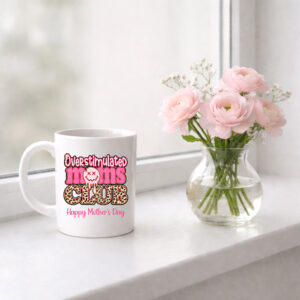 A personalised mug for mum featuring a retro, funny design saying "overstimulated Mums Club." The design is in pink and Leopard print with a Happy face. A message or name can be added to personalise.